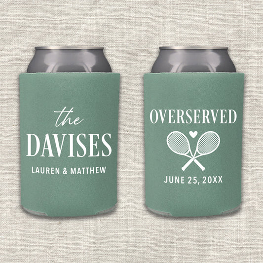 Two "Overserved" willow green tennis can coolers with personalized text on a textured beige background